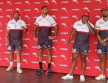 Kerr (second from left) with other Dolphins NRL players in 2024 K Bromwich + Josh Kerr + Tesi Niu + Connelly Lemuelu.jpg