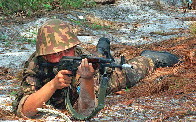 Kazakh soldier training with an AKS-74 rifle equipped with a blank fire adaptor