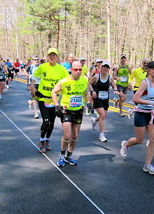 Kevin Counihan (right), of the Achilles Track Club, with his guide, running the 2011 Boston Marathon. He completed his 150th marathon at Boston in April 2014. Kevin Counihan.jpg