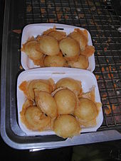 Khanom krok, Thai doughnuts with egg and coconut fillings in a foam container Khanom krok in container - Thailand.JPG