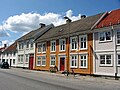 Kristiansand Tollbodgata'da tahtadan evler Avrupa'da en uzun birine bağlı tahtadan evler sırası