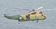 LASD's Rescue 5, flies offshore near Rancho Palos Verdes. LACS N950DF Sea King.jpg