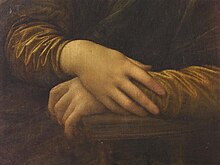 Detail of Lisa's hands, her right hand resting on her left. Leonardo chose this gesture rather than a wedding ring to depict Lisa as a virtuous woman and faithful wife.[50]