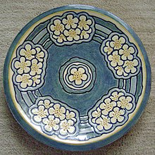 Plate potted by Joseph Meyer and decorated by Mazie T. Ryan, 1905 MTRyanG.jpg