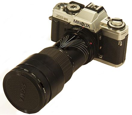 Camera Fitted with an after-market zoom lens Minoltaxg-m.JPG