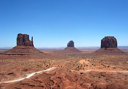 The two mittens in Monument Valley are on the left in this photograph