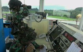 Kopasgat soldiers during air base defense operations which are capable for conducting Air Traffic Control activities during air base lock-down status Paskhas atc.png