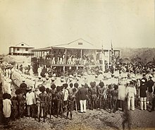 British annexation of southeast New Guinea in 1884 Reading the proclamation of annexation, Mr Lawe's house, Port Moresby, New Guinea, November 1884 - photographer John Paine or Augustine E. Dyer (5708761723).jpg