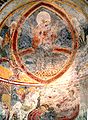 Fresco del baptisterio de San Juan[10]​ en Riva San Vitale, de difícil datación (siglos X al XII).