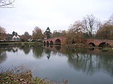 Modern view of the Great House on the left and Sonning Bridge on the right from the opposite bank of the River Thames. River Thames - Sonning Bridge - geograph.org.uk - 97274.jpg
