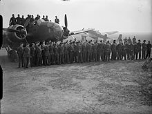 Aircrews of No. 50 Squadron in front of their Hampdens at Waddington, Lincolnshire, shortly after returning from a raid on the German fleet in the Bergen Fjord, Norway, on 9 April 1940 Royal Air Force Bomber Command, 1939-1941. C1179.jpg