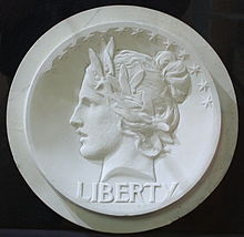 Saint-Gaudens model for the cent obverse. With an Indian headdress added, the design was later developed for the gold eagle coins.