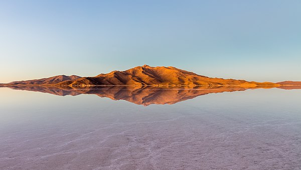 Mountains surrounding the Uyuni salt flat during sunrise, Daniel Campos Province, Potosí Department, southwestern Bolivia, not far from the crest of t