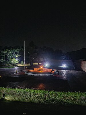 The Eternal Flame, where Mujib gave his historic 7 March speech, illuminated at night Shikha Chirantan, Dhaka, Bangladesh 3.jpg