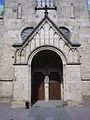 Ingången vid södra korsarmen. Sankta Maria finns som skulptur i portalen.
