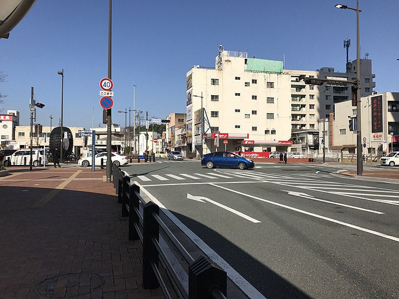 File:Street view in front of east entrance of Kurume Station.jpg