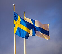 Swedish and Finnish flag Swedish and Finnish flag flying in front of Ikea Raisio, Finland.jpg