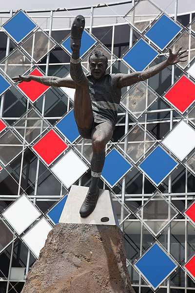 Footscray legend E. J. Whitten played his 321st and final game in 1970 to become the VFL games record holder. (Pictured: Statue of Whitten outside Whi