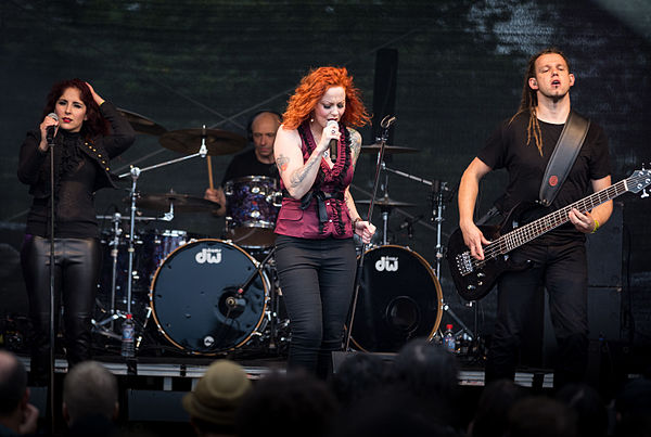 The Gentle Storm live at the 2015 Wacken Open Air. From left to right: Marcela Bovio, Ed Warby, Anneke van Giersbergen and Johan van Stratum