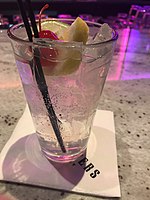 A Tom Collins, serviced in a glass of the same name. Tom Collins, Seven Feathers.jpg