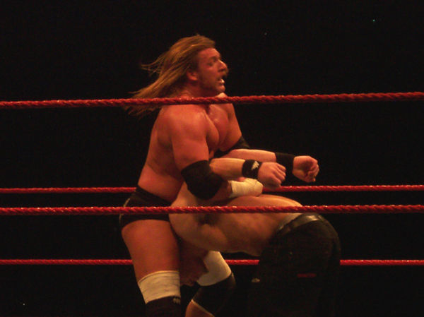 Triple H setting up the Pedigree on John Cena in October 2005.