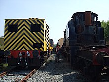 Rail crane 81353 (left) and rail crane 941602 stand together at Ruddington Two NTHC rail cranes.JPG