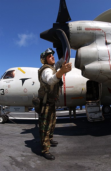 File:US Navy 050509-N-2143T-017 Aviation Machinist's Mate 3rd Class Michael Barabbs of Sterling, Mass., performs a pre-flight inspection on the propellers of an E-2C Hawkeye.jpg