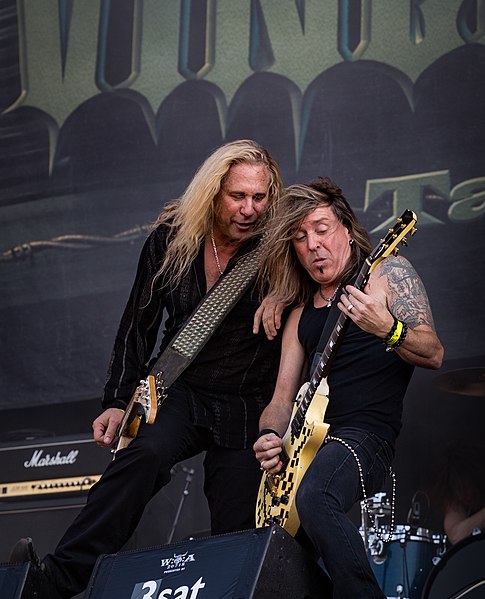 Dana Strum and Jeff Blando on stage in 2018