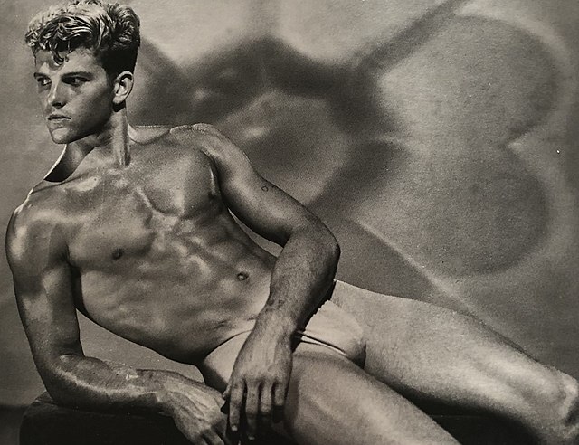 A 1950 photograph from physique studio Athletic Model Guild. Physique models were commonly photographed in "posing straps", the G-string-style underga