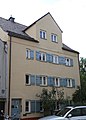 Wolfgangstraße 4; Vorstadthaus, dreigeschossiger Satteldachbau mit Zwerchhäusern, wohl um 1800. This is a picture of the Bavarian Baudenkmal (cultural heritage monument) with the ID D-1-62-000-7669 (Wikidata)