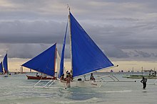 A traditional paraw double-outrigger sailboat (bangka) from the Philippines Yacht of Boracay.jpg