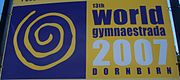Beschreibung des Bildes der 13. Welt gymnaestrada Logo.JPG.