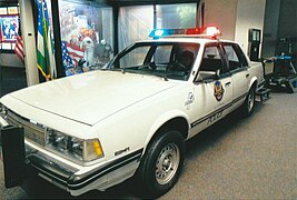 1986 Chevrolet Celebrity 4-door sedan in police cruiser configuration, on display at the Phoenix Police Museum