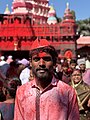 A man is celebrating Red Festival - Shrinath Mahaskoba Yatra, Veer