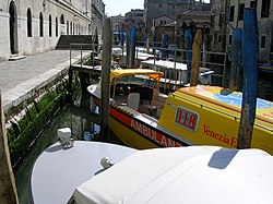 ambulance boat in the canal along the Hospital of Venice.