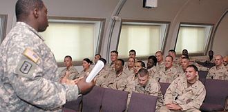 Guantanamo guards receiving a Behavioral Science briefing. BSCT briefing, Guantanamo.jpg