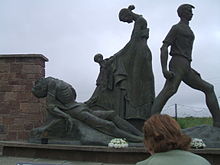 Memorial designed by Yann Goulet to the Republican soldiers killed by Free State troops at Ballyseedy, County Kerry in a mass killing of prisoners on 7 March 1923. The month of March was marked by a series of such atrocities in Kerry Ballyseedy monument.jpg