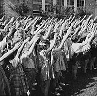 A group of U.S. schoolchildren pledging their allegiance to the flag, May 1942