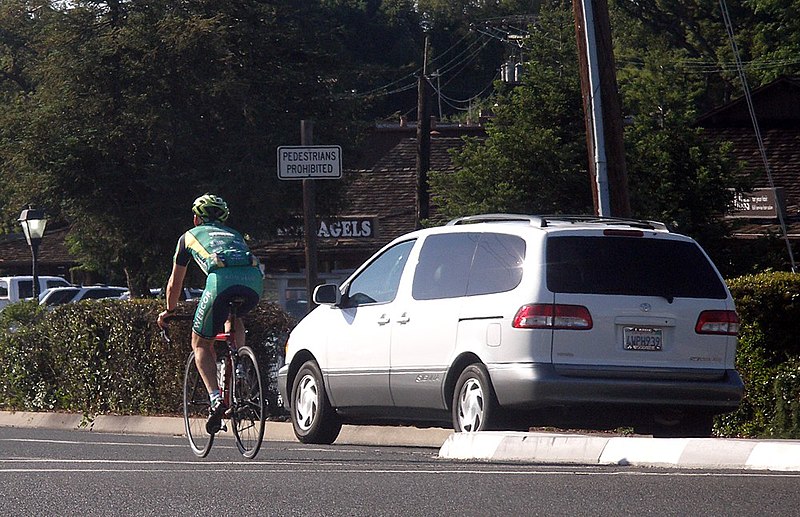 File:Bicyclistonexpressway.jpg