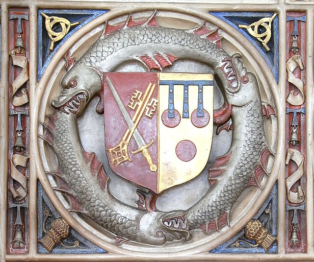 Arms of Bishop Peter Courtenay (d.1492), showing the arms of the See of Exeter impaling Courtenay of Powderham, incorporating heraldic badges of dolph