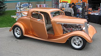 1934 Ford 3-window with a deeply chopped top, monochrome, spoke rims and suicide doors