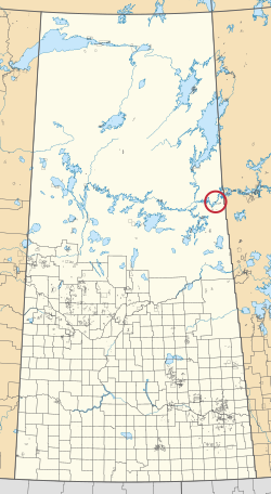 Saskatchewan vilayetinin 297 kırsal belediyesini ve yüzlerce küçük Kızılderili rezervini gösteren bir haritası. Biri kırmızı bir daire ile vurgulanmıştır.