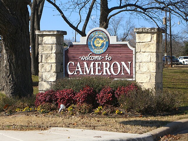 A "Welcome to Cameron" sign