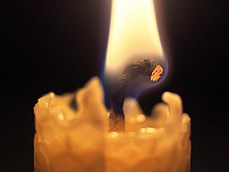 Candle wick and flame closeup