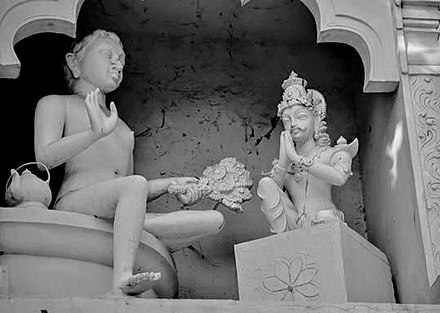 A statue depicting Chandragupta Maurya (right) with his spiritual mentor Acharya Bhadrabahu at Shravanabelagola.