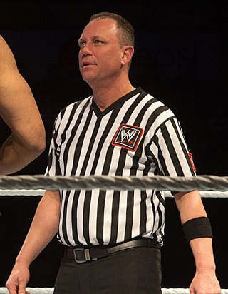 <span class="mw-page-title-main">Referee (professional wrestling)</span> Authority figure in professional wrestling