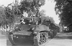 Dutch M3A3 and M3A1s column at Kemajoran, Batavia in November 1946.