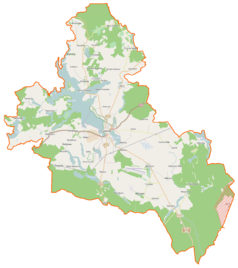 Mapa konturowa gminy Czaplinek, blisko centrum u góry znajduje się owalna plamka nieco zaostrzona i wystająca na lewo w swoim dolnym rogu z opisem „Żerdno (Jezioro Srebrne)”