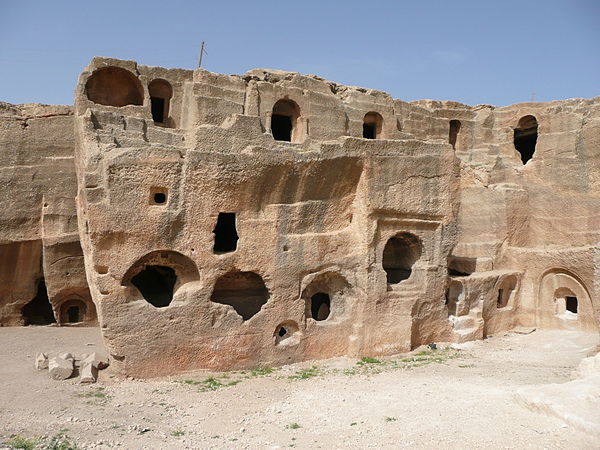 Ruins of rock-cut building in Daras