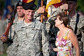 Annie McChrystal and her husband Gen. Stanley A. McChrystal smile during his retirement ceremony in Washington, D.C., on 23 July 2010. Defense.gov News Photo 100723-A-0193C-008 - Annie McChrystal and her husband Gen. Stanley A. McChrystal smile during his retirement ceremony at Fort McNair in Washington D.C. on July 23.jpg